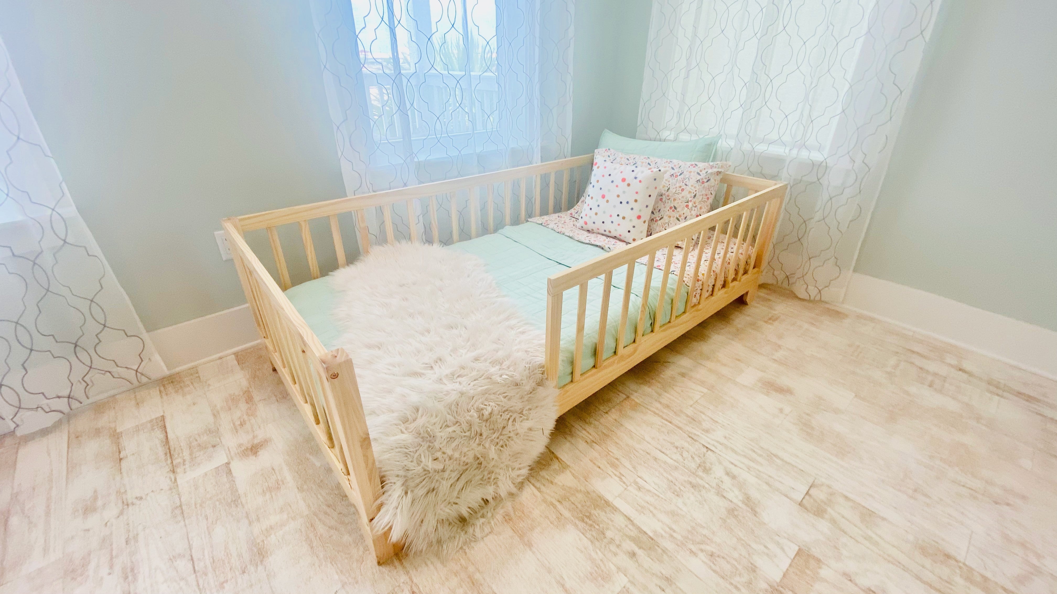 Montessori bed with clearance rails